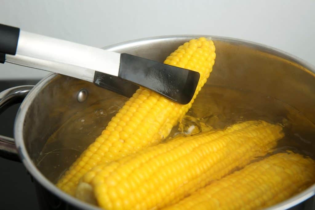 Pot of corn boiling.