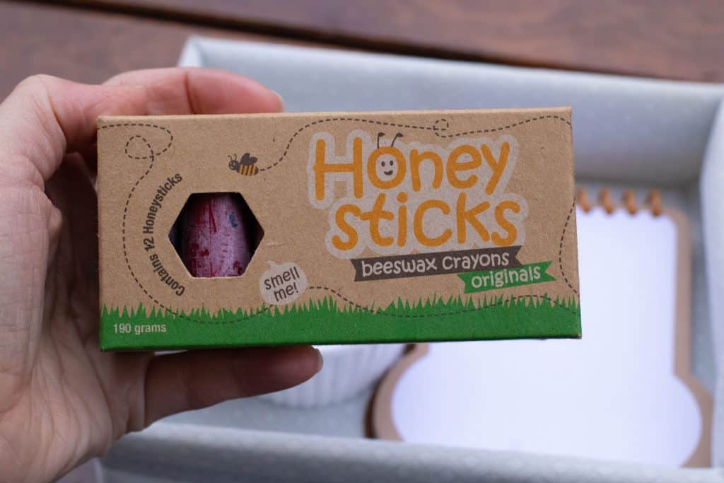 Honey Sticks Beeswax crayons box being held