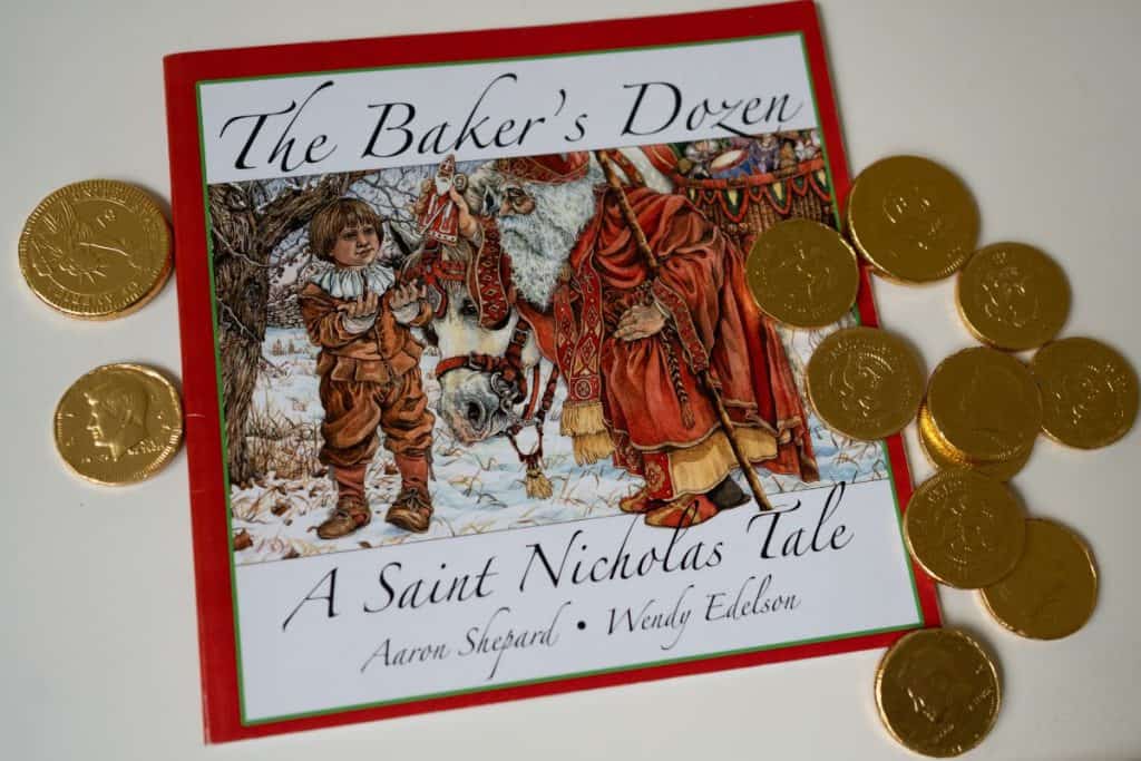 The Baker's Dozen Book with gold chocolate coins.