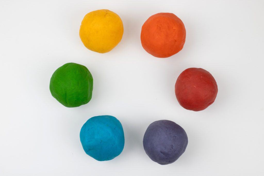 Six balls of homemade playdough.