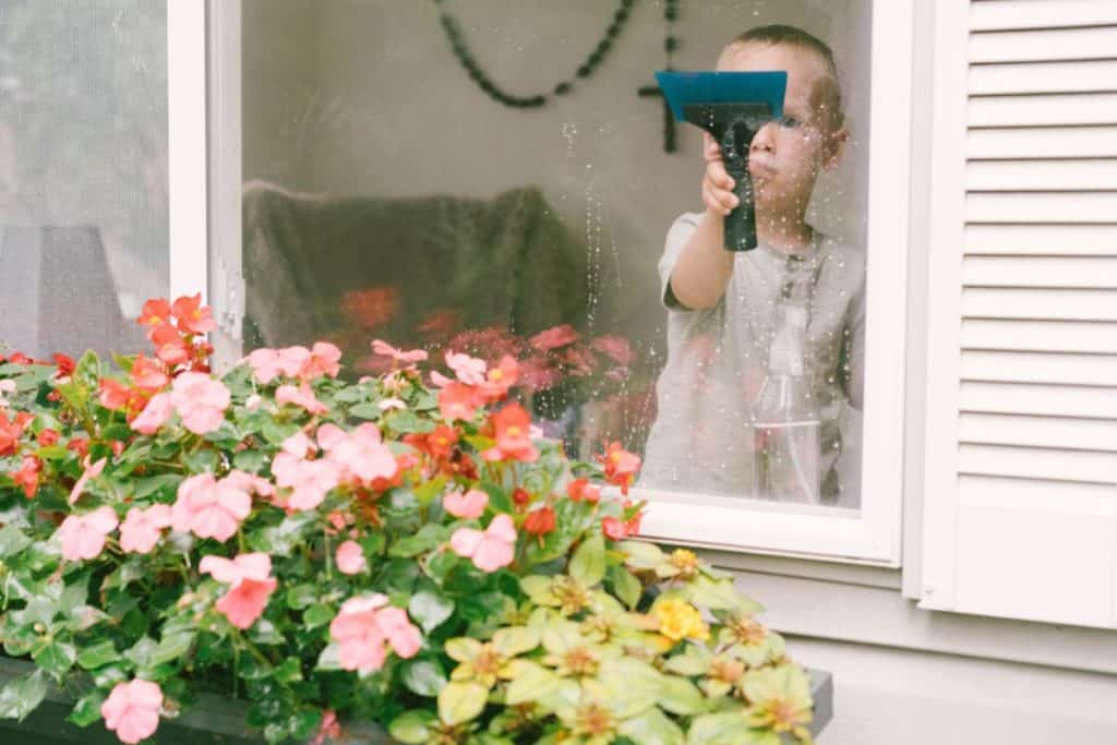 toddler washing windows